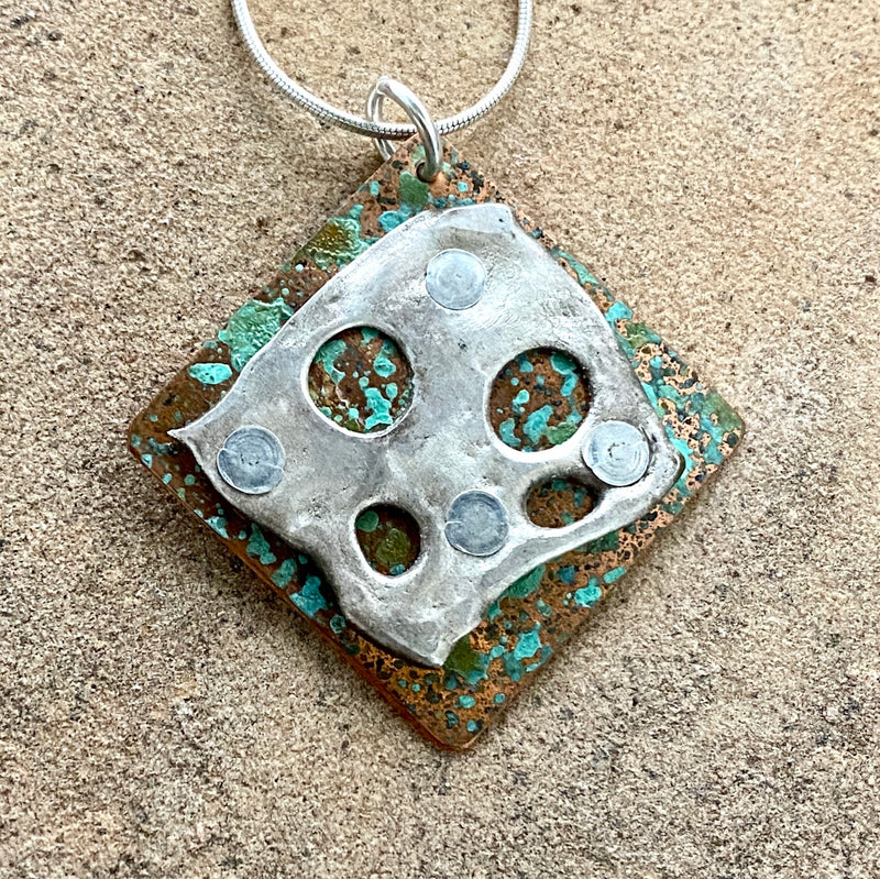 #81 Sterling Over Patina Copper Pendant